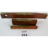 Three vintage brass bound mahogany spirit levels, one J Rabone & Sons Birmingham. Longest is 46cm.