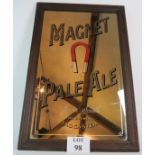 An early 20th Century John Smith's magnet pale ale advertising mirror in period oak frame.