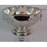 Silver plated punch bowl and ladle in antique style.