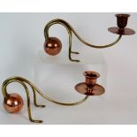 A pair of copper and brass German jugendstil cantilever candlesticks by Carl Defner, Esslingen.