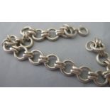 A silver fancy link bracelet, stamped '9