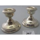 A pair of modern silver stub candlestick