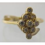 An 18ct gold and diamond ring set with n