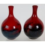 A pair of Royal Doulton red flambe veine