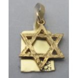 A 9ct gold 'Star of David' pendant, appr