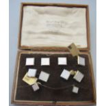 A cased set of 9ct and 18ct gold and mot