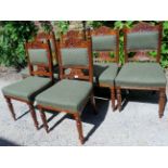 A set of six Victorian dining chairs uph