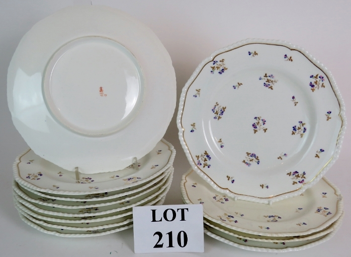 A set of 12 antique porcelain plates wit