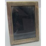 A silver rectangular frame 'Prudential C