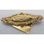 A 9ct gold 19th century bar brooch, with