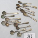 A collection of six silver mustard spoon