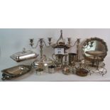 A large quantity of silver plated tableware including a pair of 3 branch candlesticks and mappin +