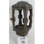 A heavy cast bronze outdoor lantern in the Brutalist style, height 32cm.