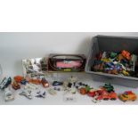A large collection of vintage toy cars and vehicles including Star Wars, Buck Rogers, Corgi, Dinky,