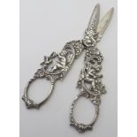 A pair of '800' marked grape scissors, heavily decorated with flowers and scrolls,
