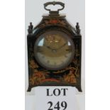 A late 19th Century Chinoiserie lacquer decorated French mantel clock with cylinder movement and
