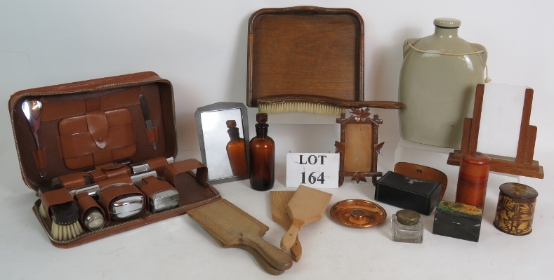A mixed collectors lot of Treen Mauchline ware, picture frames, crumb scoop, butter pats,