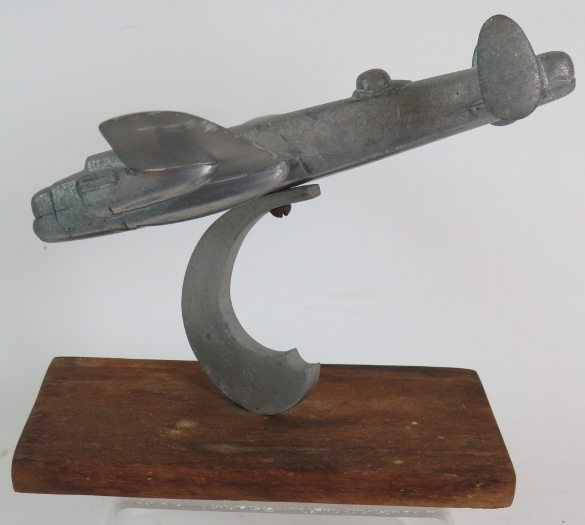 A WW2 trench art Lancaster Bomber cast in aluminium, wingspan 31cm, - Image 5 of 8