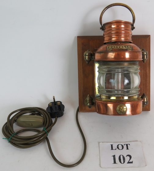 A 1940's era Seahorse masthead lamp in copper and brass,