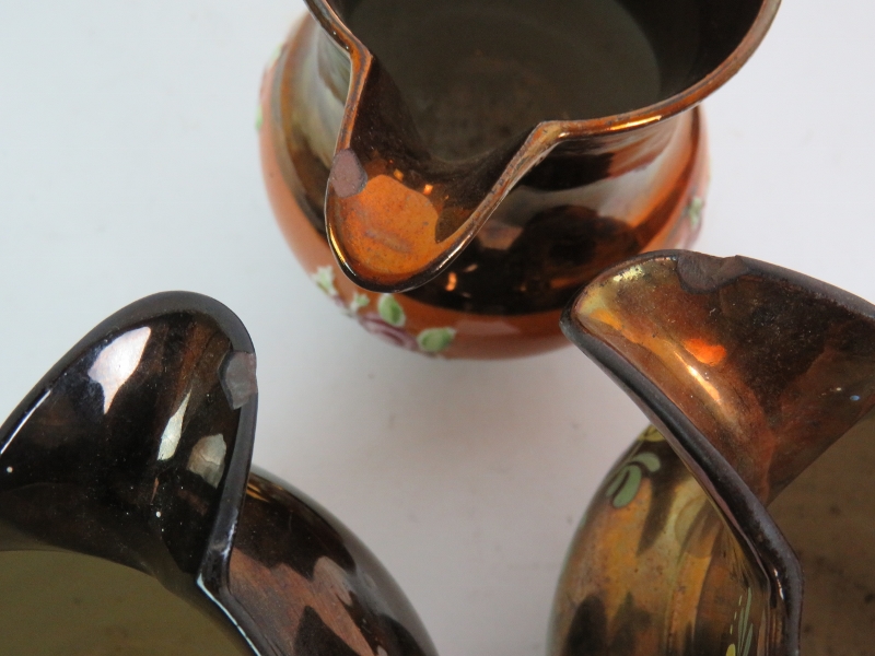 Four Victorian copper lustre ware jugs and four similar mugs, tallest is 15cm. - Image 5 of 5