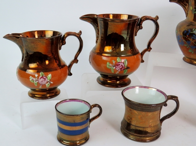 Four Victorian copper lustre ware jugs and four similar mugs, tallest is 15cm. - Image 2 of 5