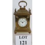 A French brass cased carriage clock in the style of a bracket clock by The Goldsmiths Company.