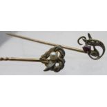 Two 19th century 15ct yellow gold stick pins, one heart shaped rope design with centre pearl,