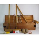 A vintage Gamages croquet set in original box, C1950's.