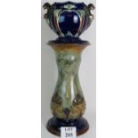 An Art Nouveau Royal Doulton stoneware jardiniere stand in graduated blue and green glaze and a