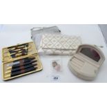 An assortment of items to include, two evening bags, (boxed),