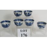 A set of 5 early 19th Century willow pattern tea bowls with fluted sides plus one other similar tea