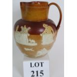 A large Doulton Lambeth stone wear harvest jug with hunting and tavern scenes. Height: 21cm.