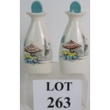 A pair of Midwinter 'Style Craft' fashion-shape oil and vinegar bottles,