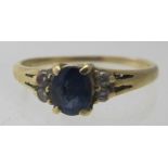 An 18ct gold ring set with an oval sapphire, approx 5mm x 6mm,