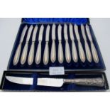 A set of silver handled tea knives, Sheffield 1911, cased,