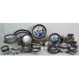 A large suite of Booth's 'Real Old Willow' blue and white tableware comprising 69 pieces,