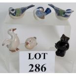 Three Royal Copenhagen porcelain bird figurines, two being a Blue Tit, number 1505,