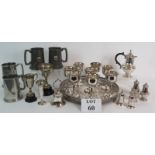 A silver plated salver with 8 goblets, two silver plated cruet sets, a coffee pot, bell, trophies,