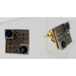 A pair of hand made 18ct yellow and white gold square shaped earrings.