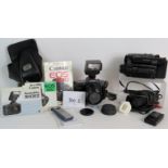 A Canon EOS 600 35mm camera and 28-70mm lens, speedlite 300EX flashgun and cases.