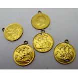 A collection of five Edwardian 1/2 sovereigns, having soldered rings, 1913, two 1914, 1905 and 1911,