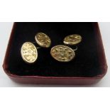 A pair of 9ct gold cuff links, engraved with flowers, approx 3.4 grams, boxed.