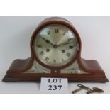 An Edwardian striking 'Napoleon' mantle clock with German movement in an inlaid mahogany case.