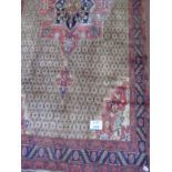 A fine Hamadan rug on fawn ground with central motif ornate border. 3.17 x 1.42.