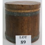 An antique oak staved country bread or corn bin with lid, 25cm high, 27cm diameter.