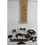 A selection of Chinese carved hardwood display stands, some antique,