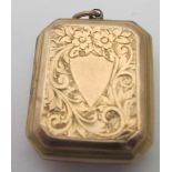 A 9ct gold back and front loaded rectangular double locket having engraved decoration.