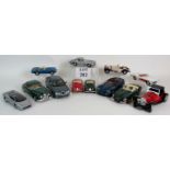 A collection of twelve model cars by Maisto and Burago including eight different Jaguar models,