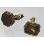 Two small yellow metal 19th century seals set with citrines, one etched with a thistle,