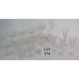 A set of 10 cut crystal champagne coupe glasses and five cut glass trumpet shaped. Wine glasses, 15.
